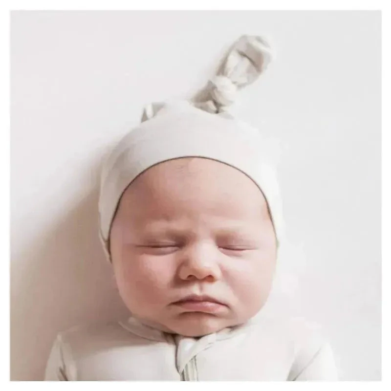 Kyte Baby - Bamboo Baby Knotted Cap In Oat 3 Kyte Baby - Bamboo Baby Knotted Cap In Oat