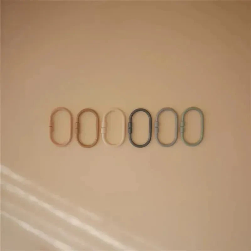 Mushie - Baby Chain Link Rings Toy 12 Count, Multiuse Car Seat Stroller Connecting Toy, Shifting Sand, Blush, Cambridge Blue 4 Mushie - Baby Chain Link Rings Toy 12 Count, Multiuse Car Seat Stroller Connecting Toy, Shifting Sand, Blush, Cambridge Blue - Image 2